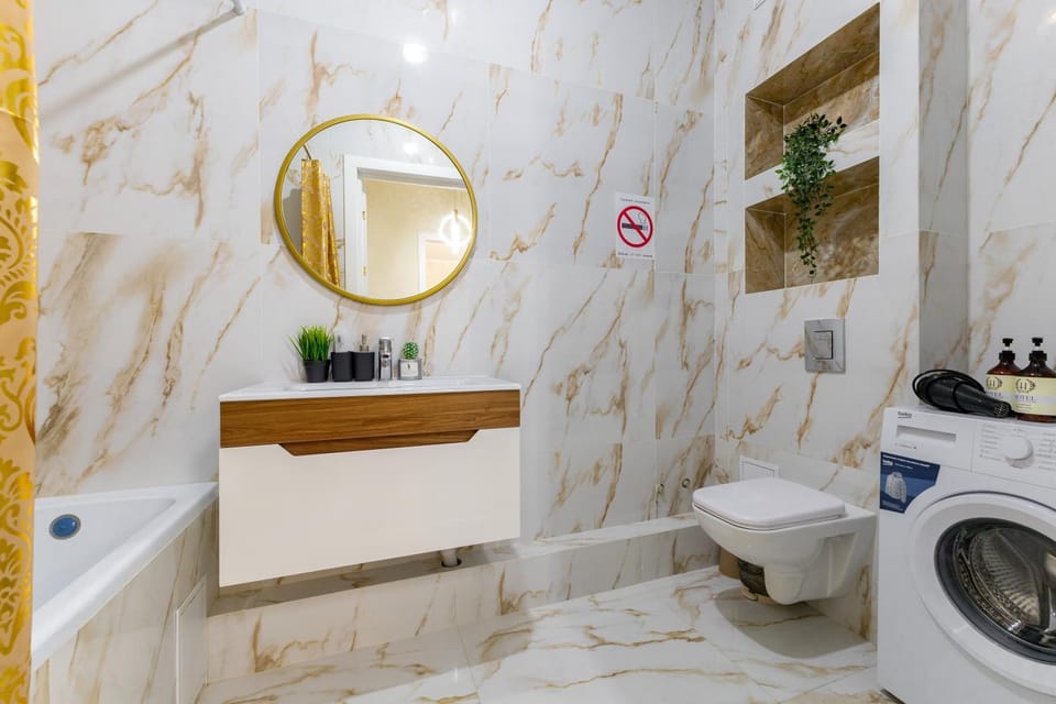 Shower, Toilet, Bathroom, towels, washing machine, dryer