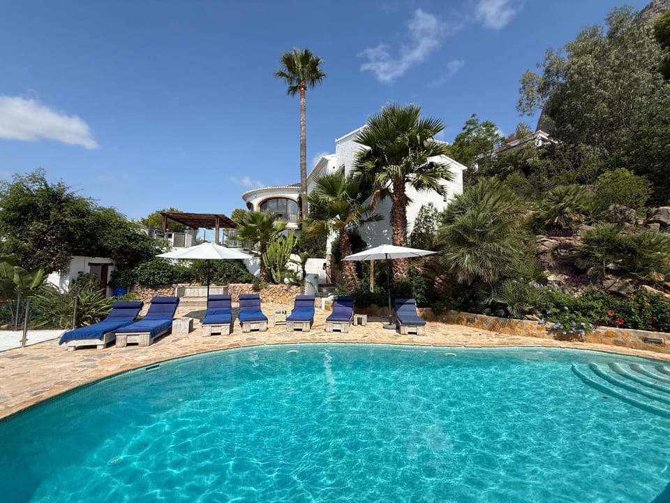 Property building, Living room, Swimming pool
