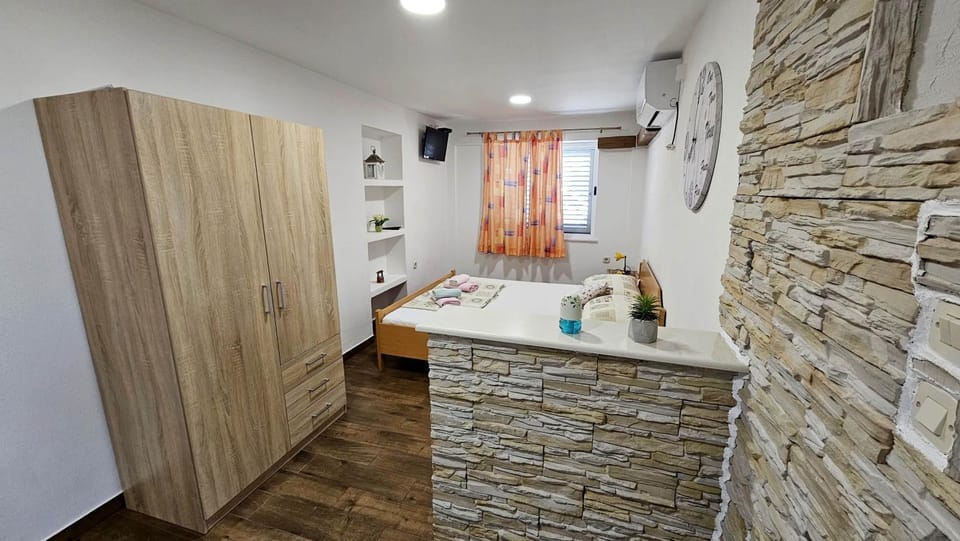 Bed, wardrobe, air conditioner