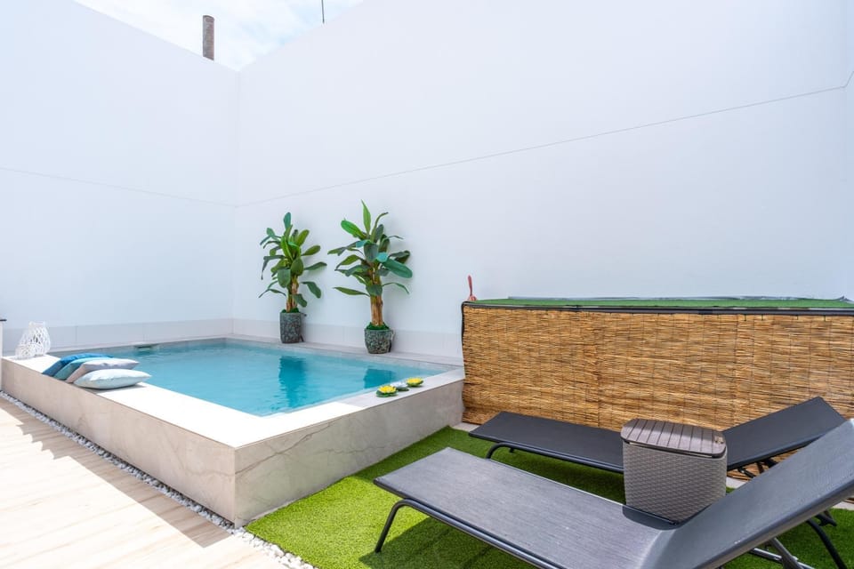 Property building, Living room, Swimming pool