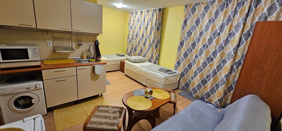 Kitchen or kitchenette, stove, washing machine