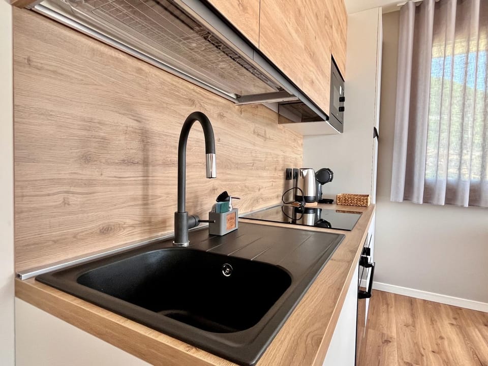 Kitchen or kitchenette, stove