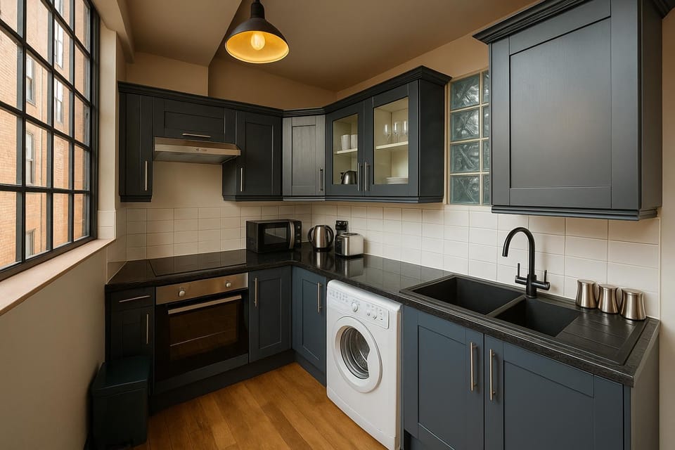 Kitchen or kitchenette, oven, stove, toaster, washing machine