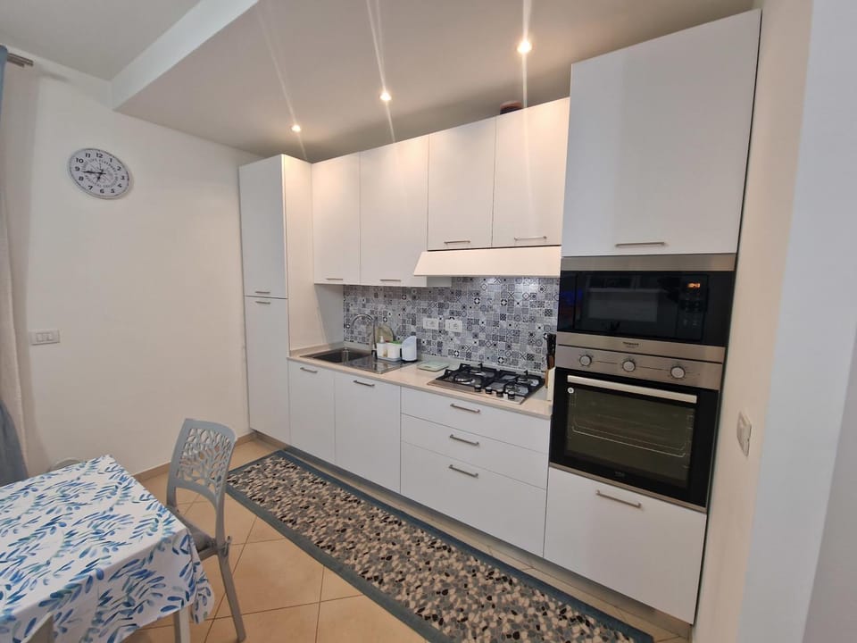 Kitchen or kitchenette, oven, stove