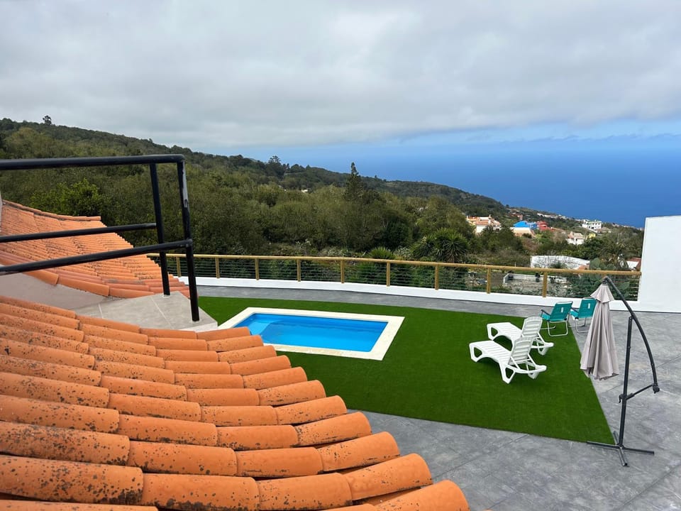 Property building, Living room, Swimming pool