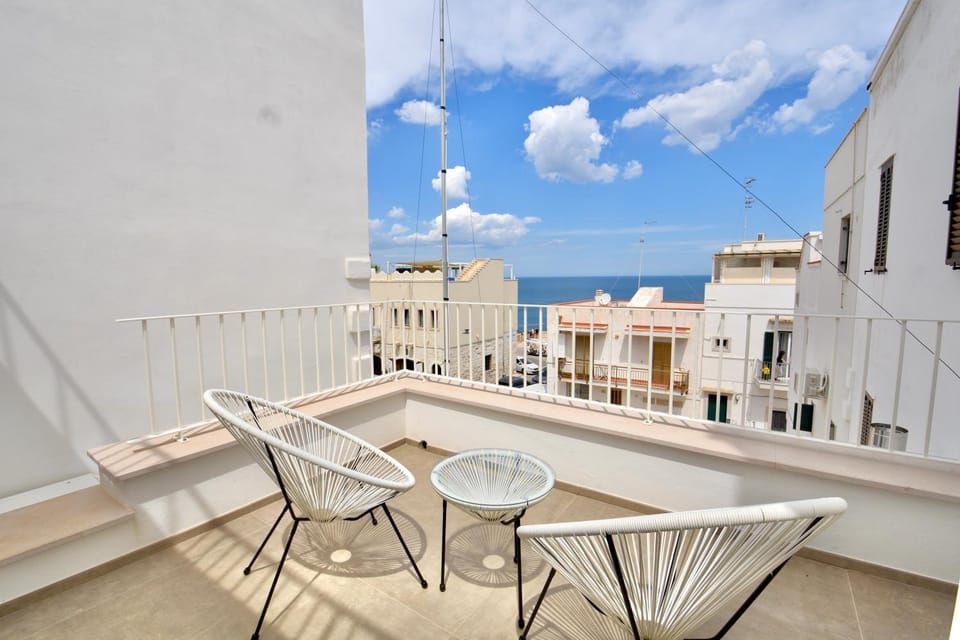 Property building, Patio, Day, Natural landscape, View (from property/room), Balcony/Terrace, Living room, Seating area, Dining area, Sea view