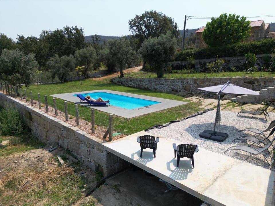 Property building, Living room, Swimming pool