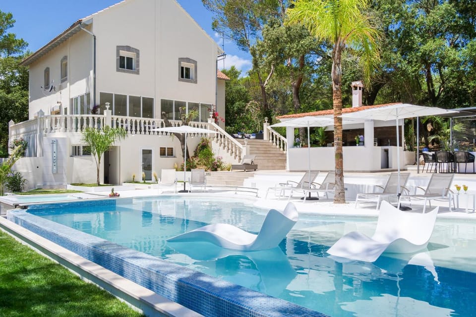 Property building, Living room, Swimming pool