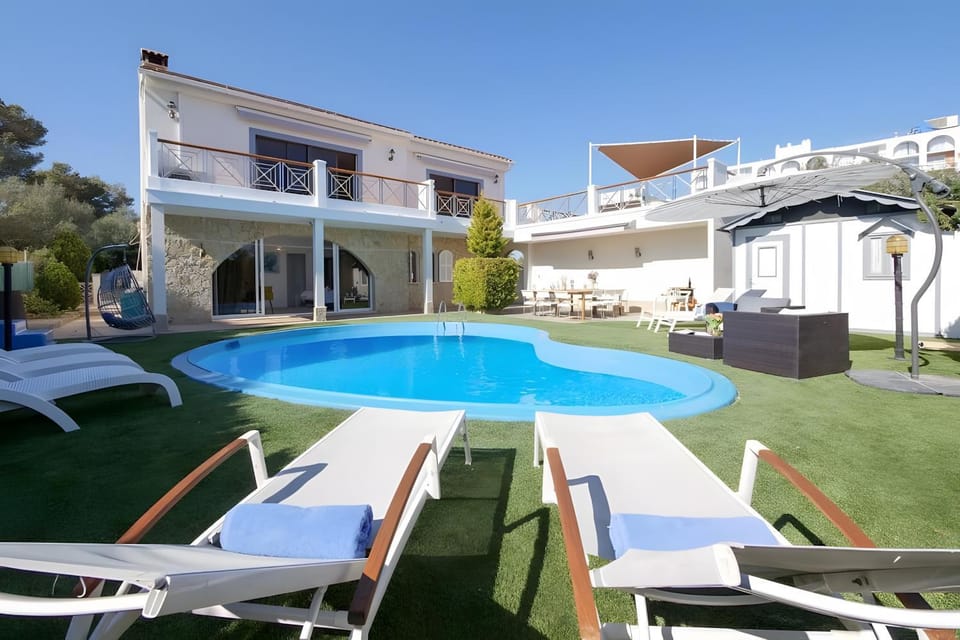 Property building, Living room, Swimming pool