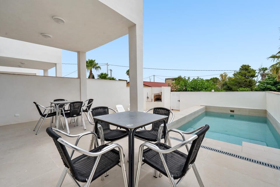 Property building, Living room, Swimming pool