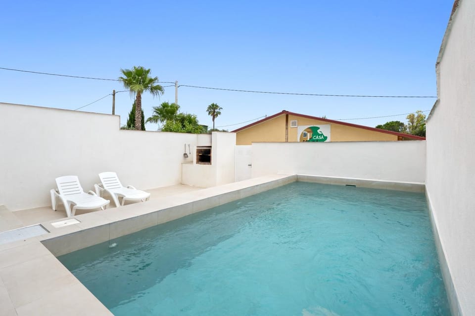 Property building, Living room, Swimming pool