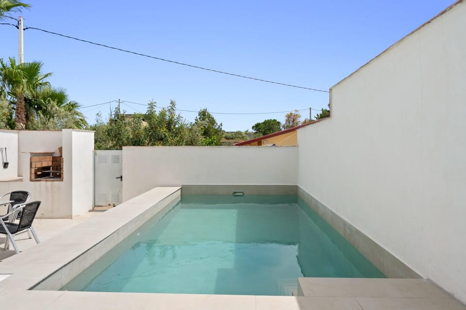 Property building, Living room, Swimming pool