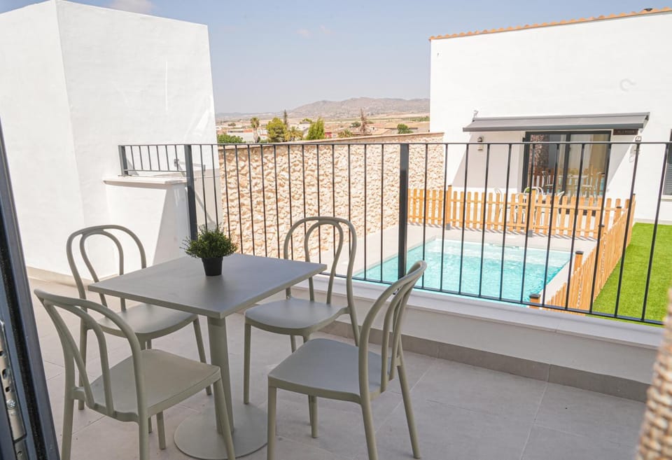 Property building, Patio, Natural landscape, View (from property/room), Balcony/Terrace, Pool view, Swimming pool