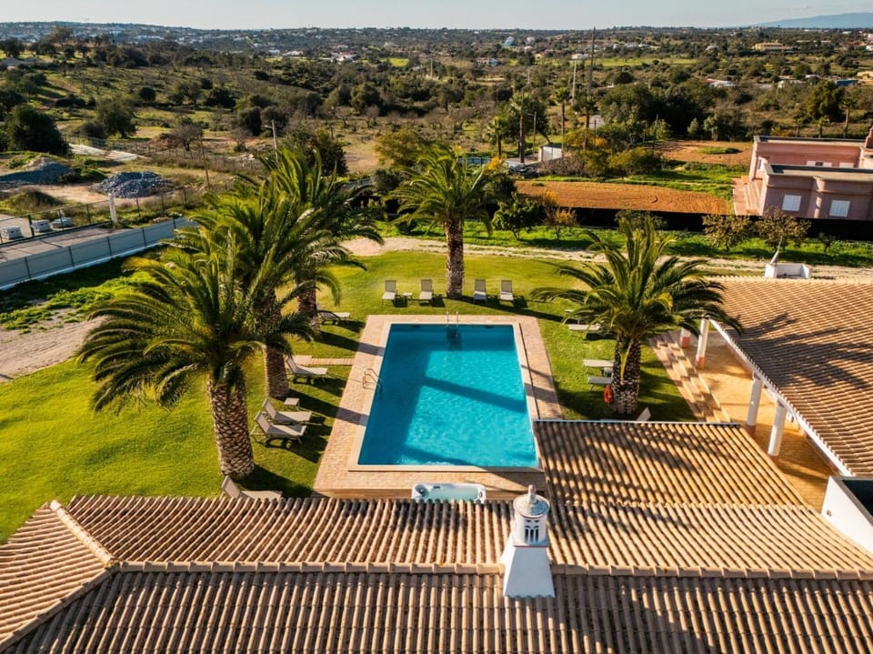 Property building, Living room, Swimming pool