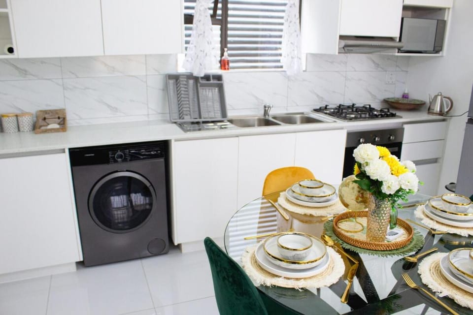 Kitchen or kitchenette, washing machine