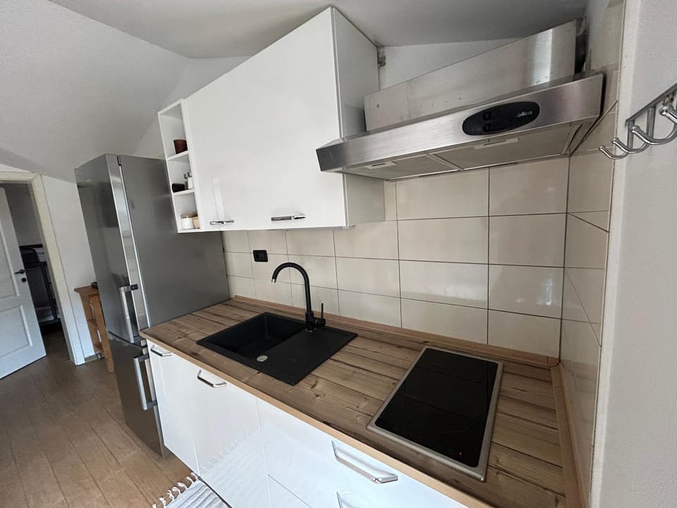 Kitchen or kitchenette, stove