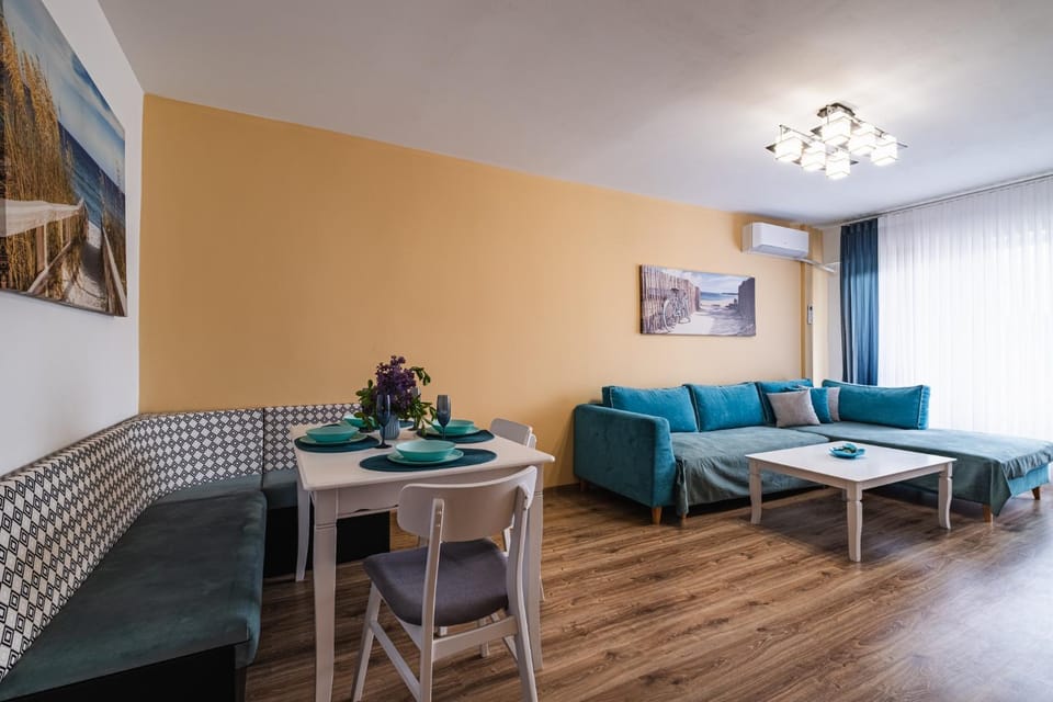 View (from property/room), Living room, Decorative detail, Seating area, Dining area, furniture, air conditioner