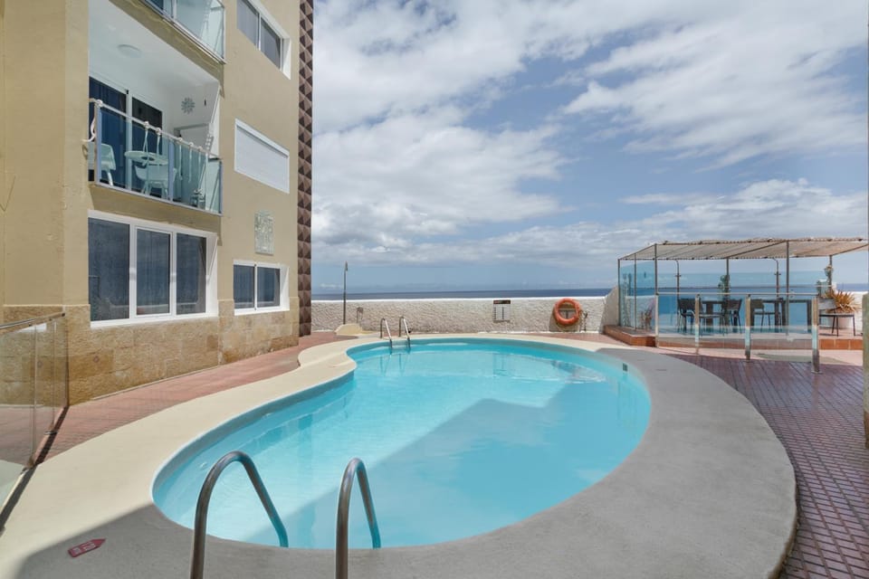 Property building, Living room, Swimming pool