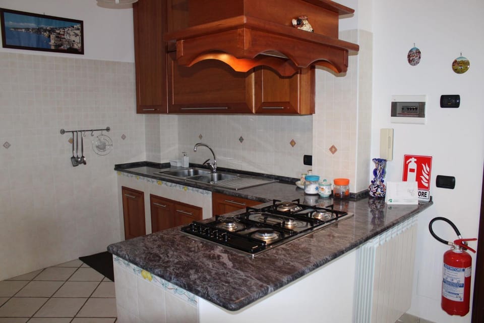 Kitchen or kitchenette, stove