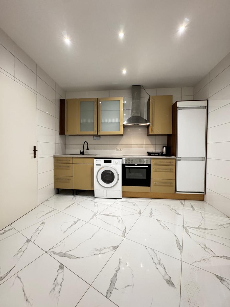 Kitchen or kitchenette, stove, washing machine