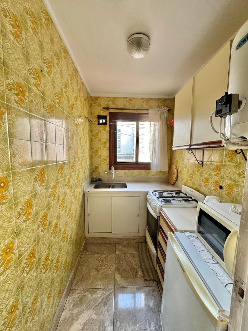 Kitchen or kitchenette, oven, stove