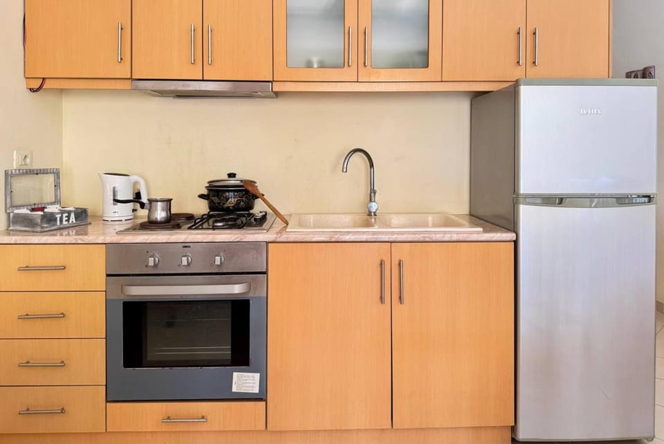 Kitchen or kitchenette, oven, stove