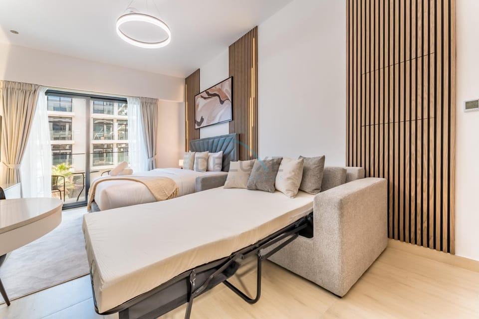 Bed, Living room, Seating area, Bedroom