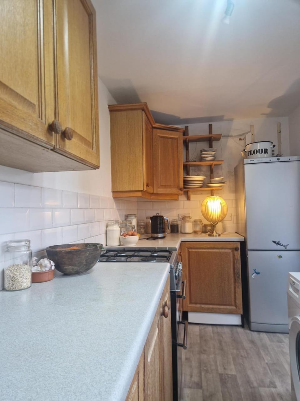 Kitchen or kitchenette, dishwasher, oven, stove, toaster