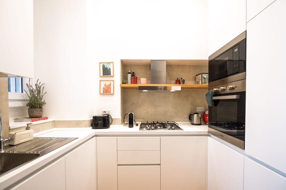 Kitchen or kitchenette, stove, toaster