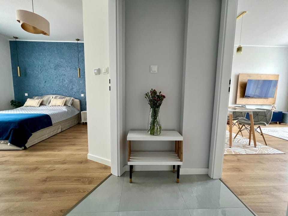 Bed, Living room, Seating area, Bedroom