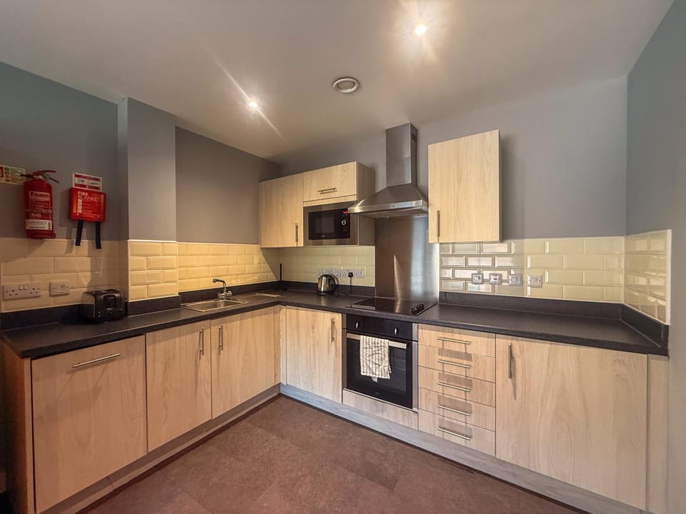 microwave, oven, stove, washing machine, kitchen