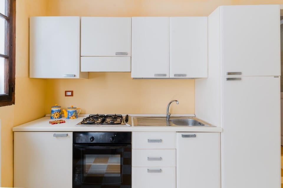 Kitchen or kitchenette, oven, stove