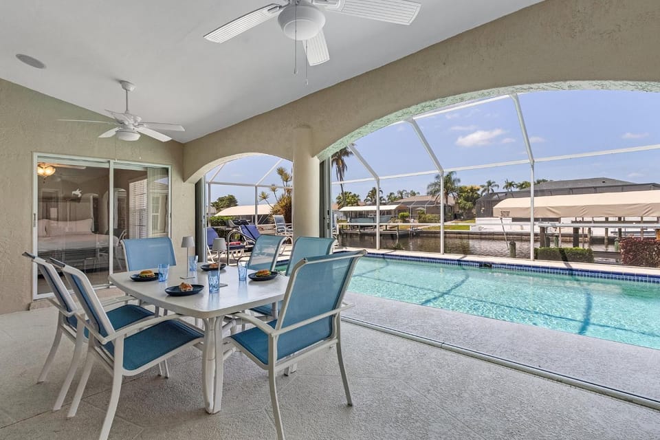 Heated Pool, Gulf Access & Dock, Pet Friendly - Villa Canal Breeze - Roelens House in Cape Coral