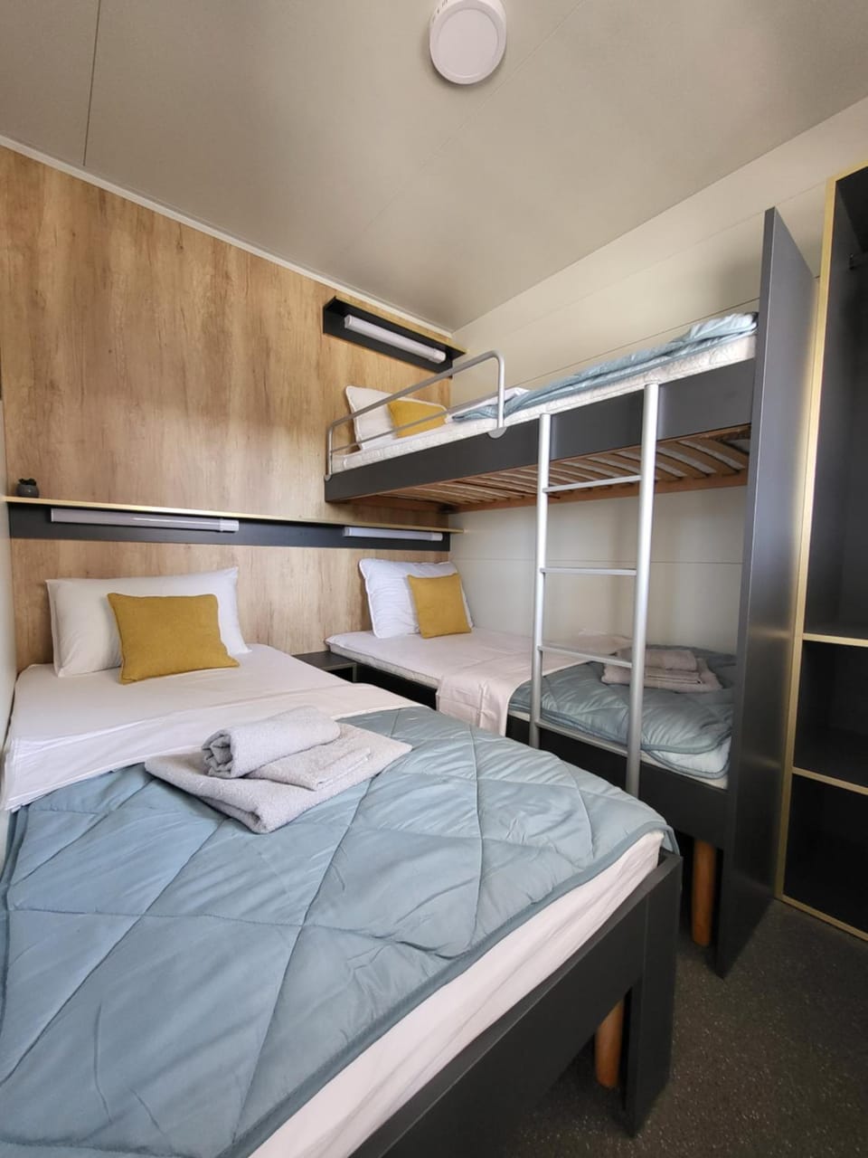 Bed, Photo of the whole room, Bedroom, bunk bed, towels, wardrobe