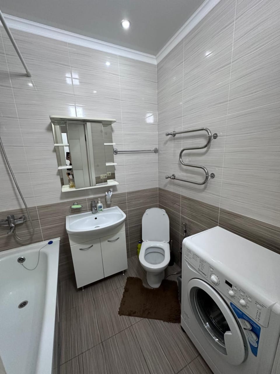 Toilet, Bathroom, towels, washing machine, dryer