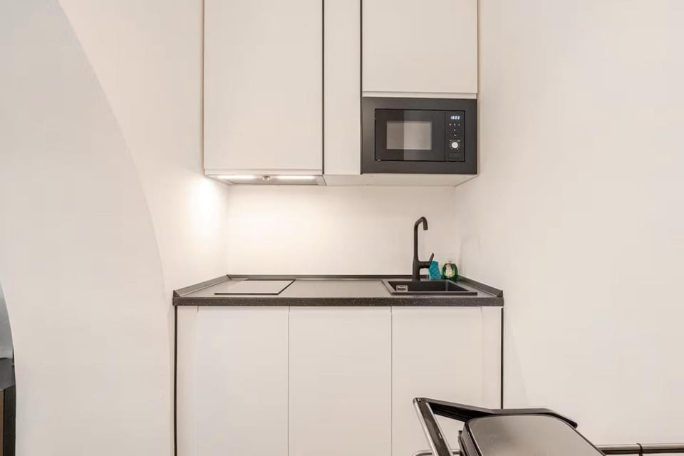 Kitchen or kitchenette, stove