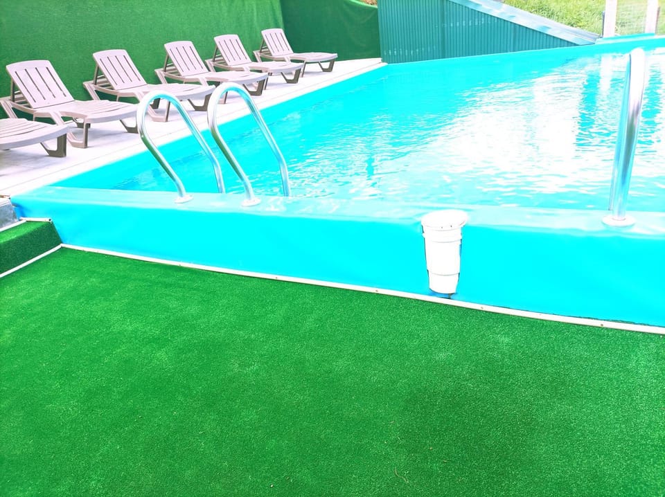 Swimming pool, sunbed