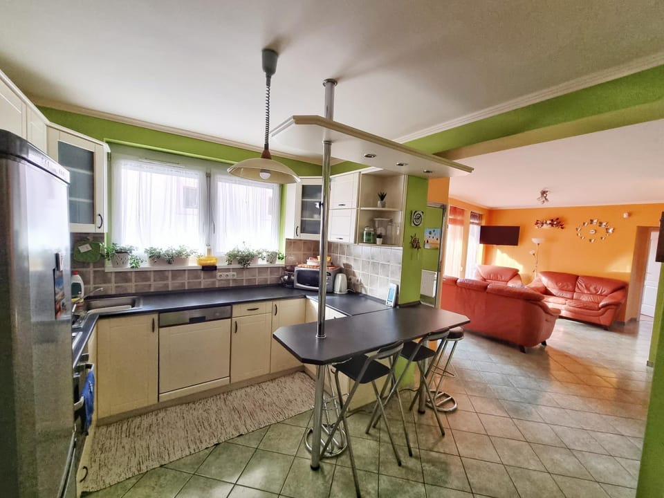 Kitchen or kitchenette, Living room, Dining area, microwave, oven, stove, toaster, toaster, kitchen, kitchen, air conditioner, air conditioner