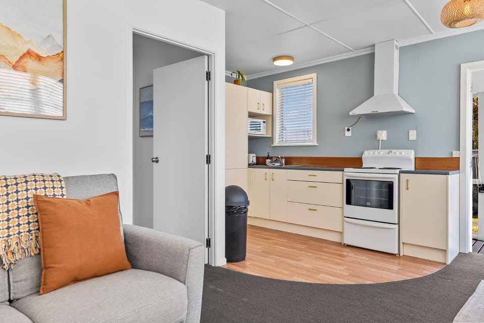 Kitchen or kitchenette, Living room, microwave, oven, stove
