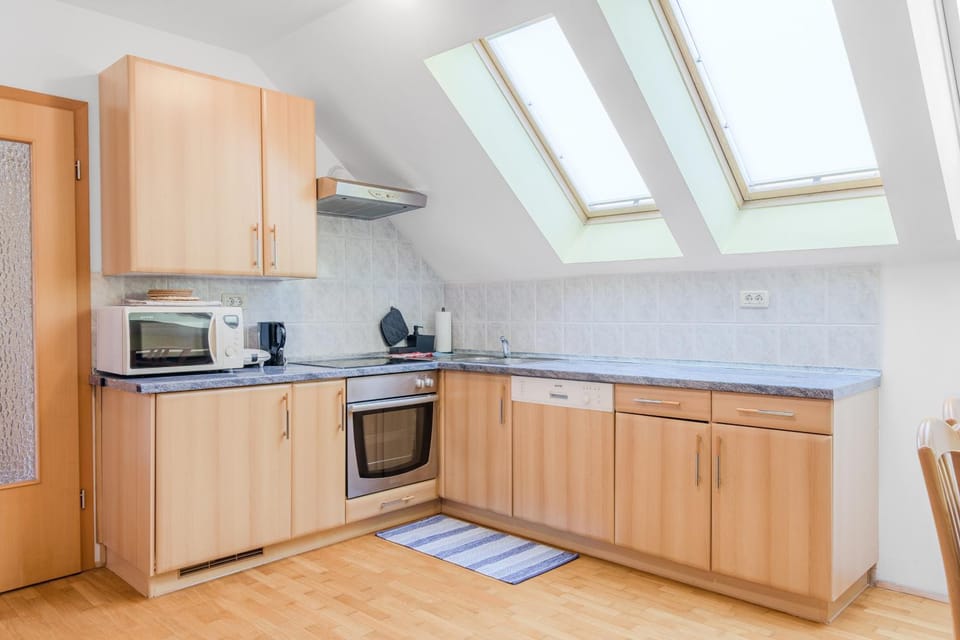 Kitchen or kitchenette, dishwasher, microwave, oven, stove, toaster, kitchen
