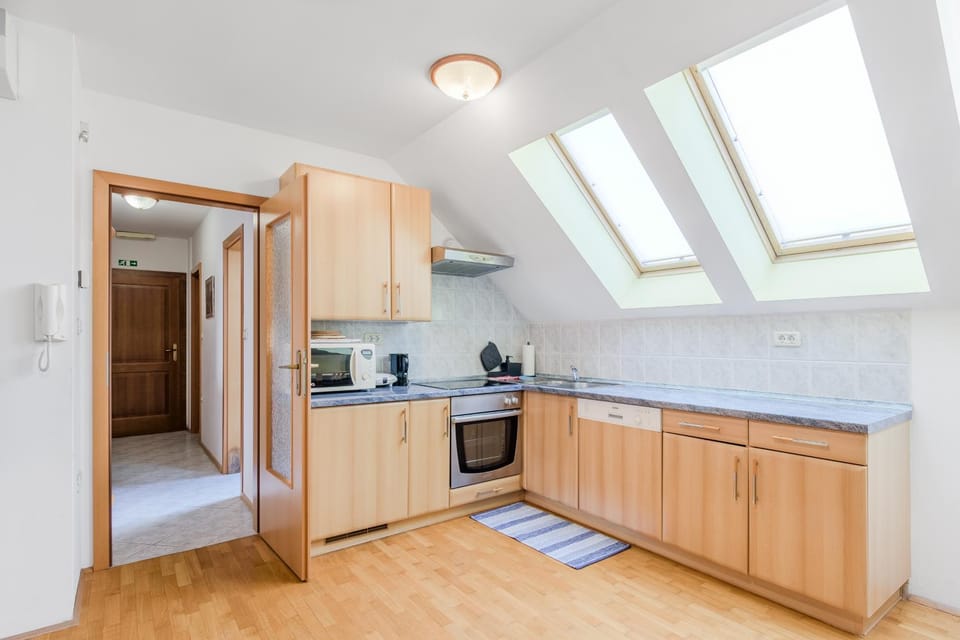 Kitchen or kitchenette, dishwasher, microwave, oven, stove, toaster, kitchen