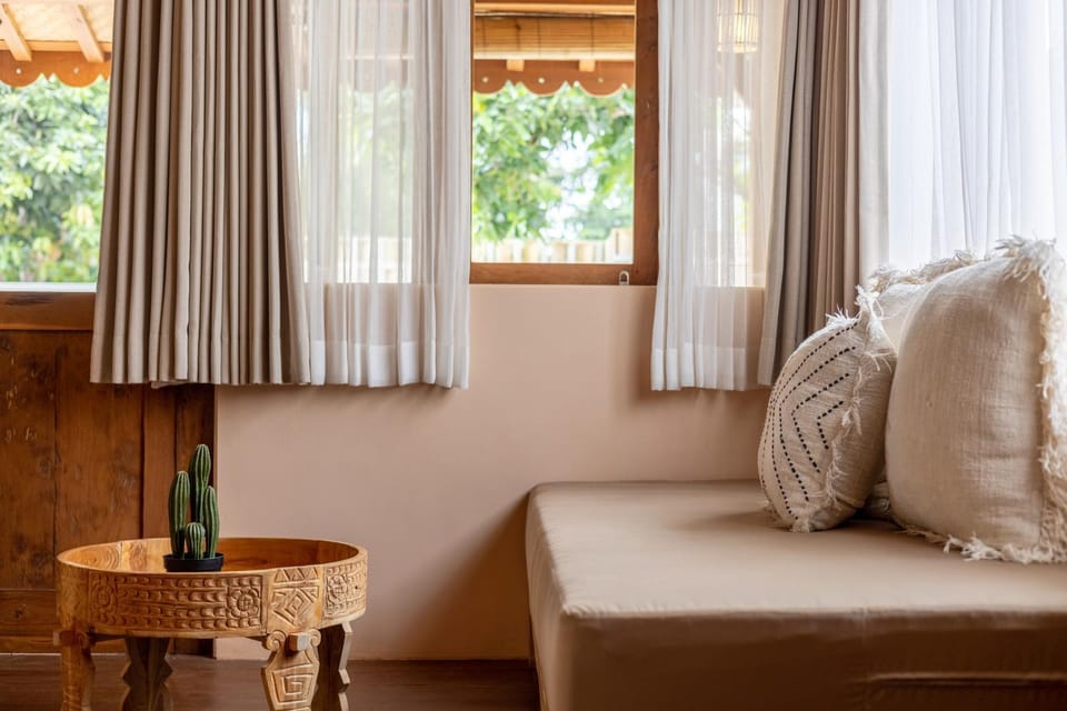 Bed, Living room, Seating area, Bedroom