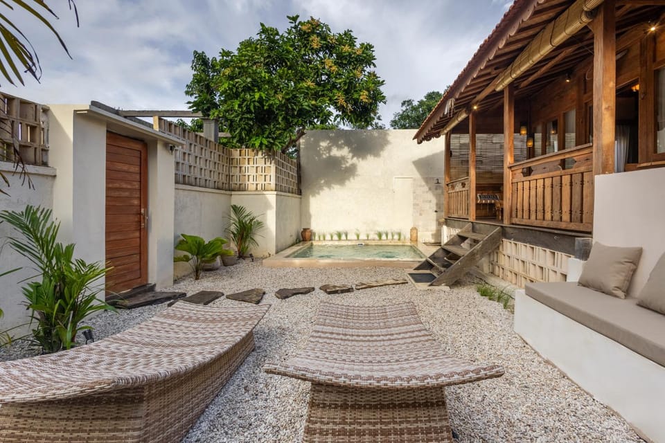 Property building, Patio, Day, Natural landscape, Garden, Seating area, Garden view, Pool view, Swimming pool