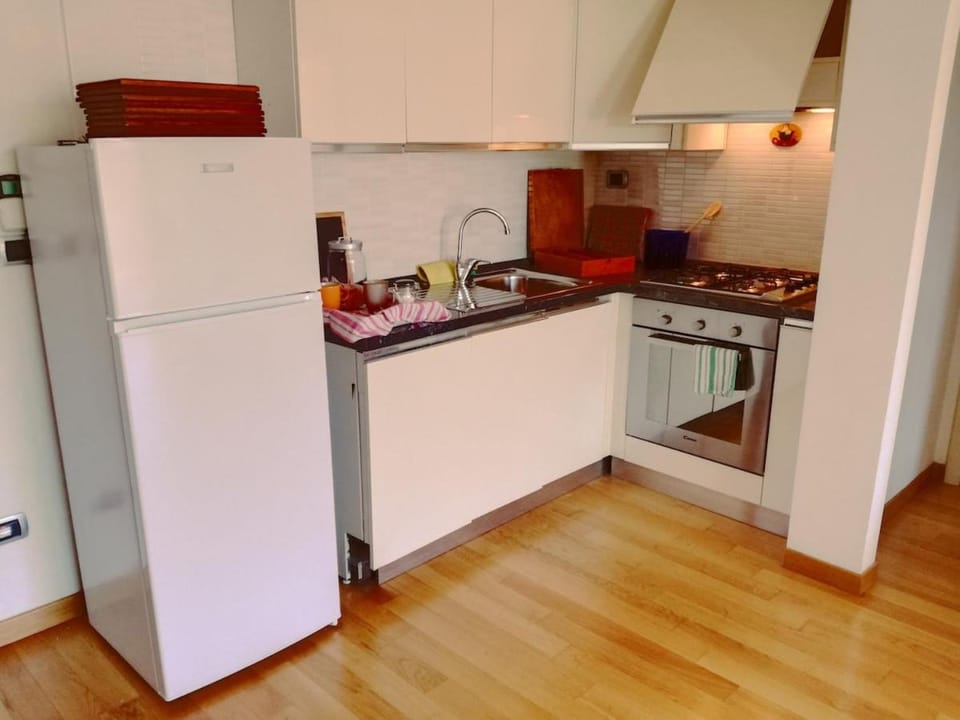 Kitchen or kitchenette, oven, stove