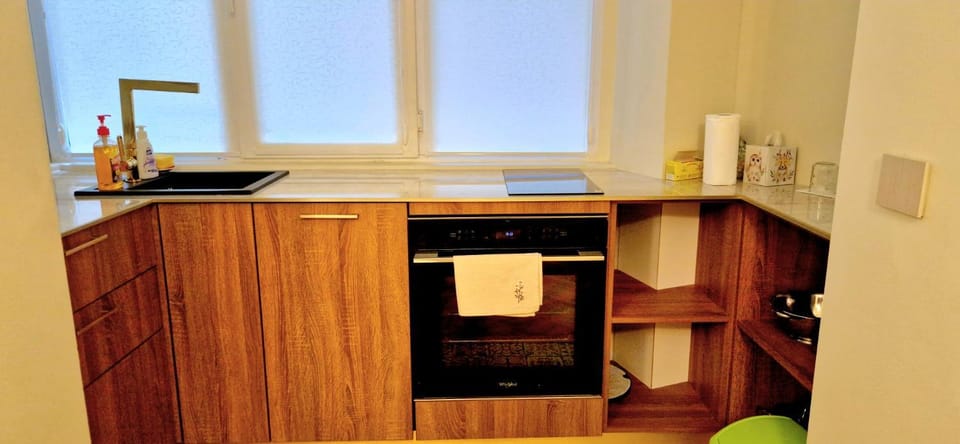 Kitchen or kitchenette, oven, stove