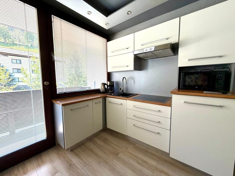 Kitchen or kitchenette, stove