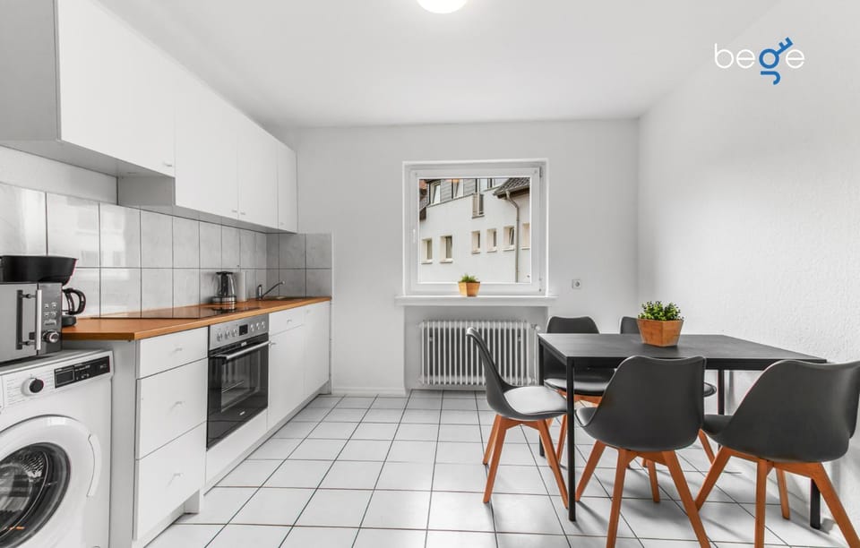 Kitchen or kitchenette, dishwasher, stove, toaster, washing machine