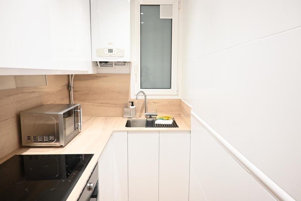 Kitchen or kitchenette, stove