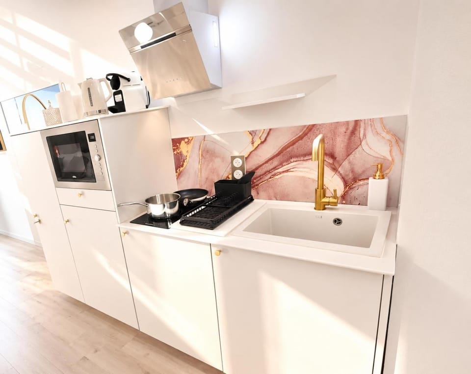 Kitchen or kitchenette, oven, stove, toaster