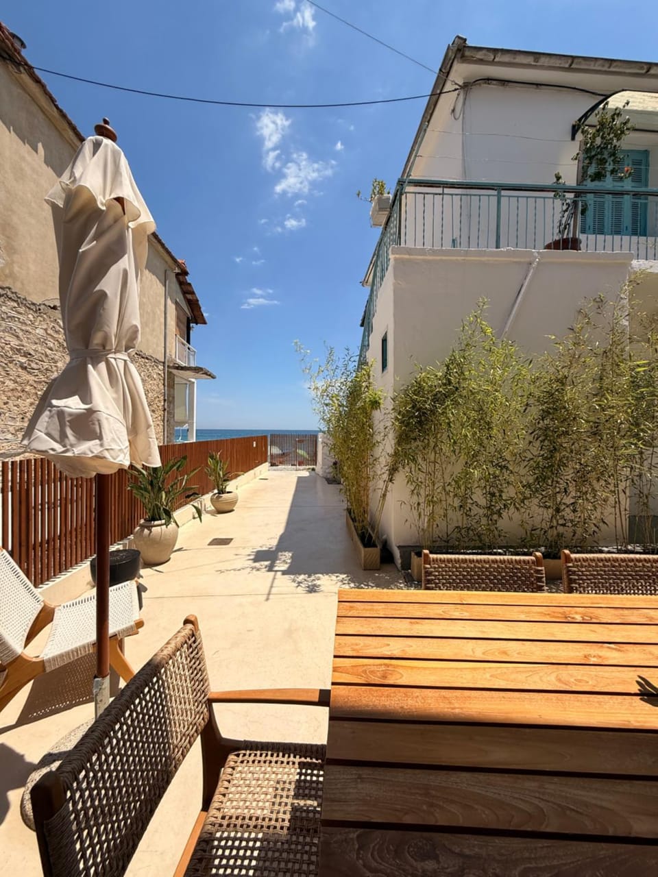 Property building, Patio, Day, Summer, View (from property/room), Dining area, Food, Sea view, Family, Inner courtyard view, acessibility